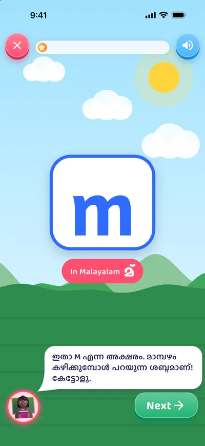 A lesson: the letter m with its Malayalam sound and Naina Teacher speaking in Malayalam